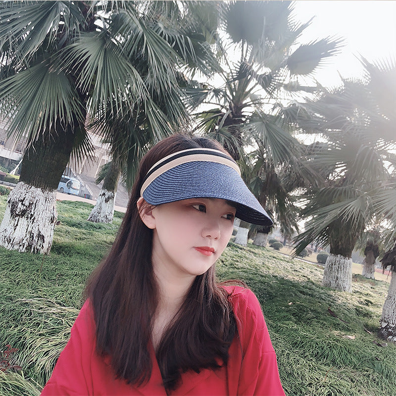 Trenches of Mariana visor hat with wide brim and adjustable strap, lightweight sun protection accessory for outdoor wear.