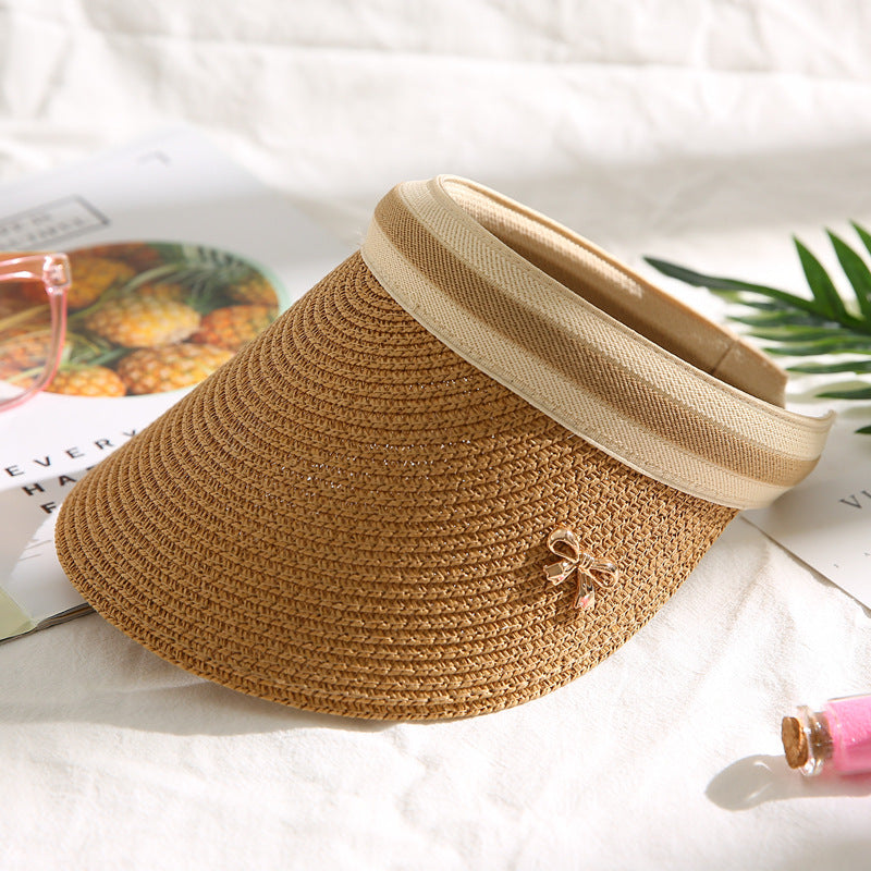 Trenches of Mariana visor hat with wide brim and adjustable strap, lightweight and stylish for sun protection.