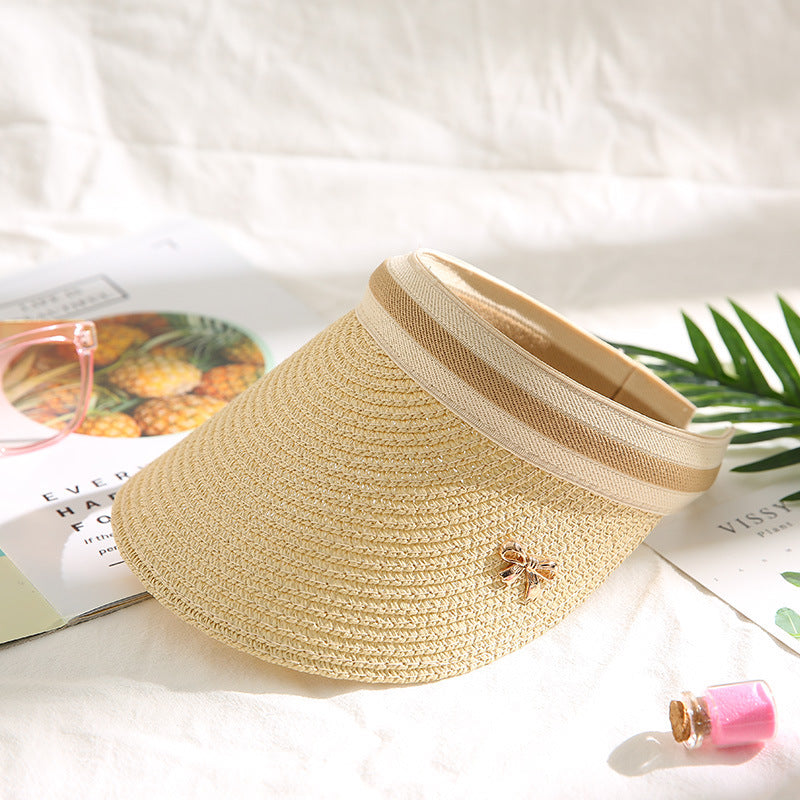 Trenches of Mariana visor hat with wide brim and adjustable strap, stylish sun protection accessory for outdoor wear.