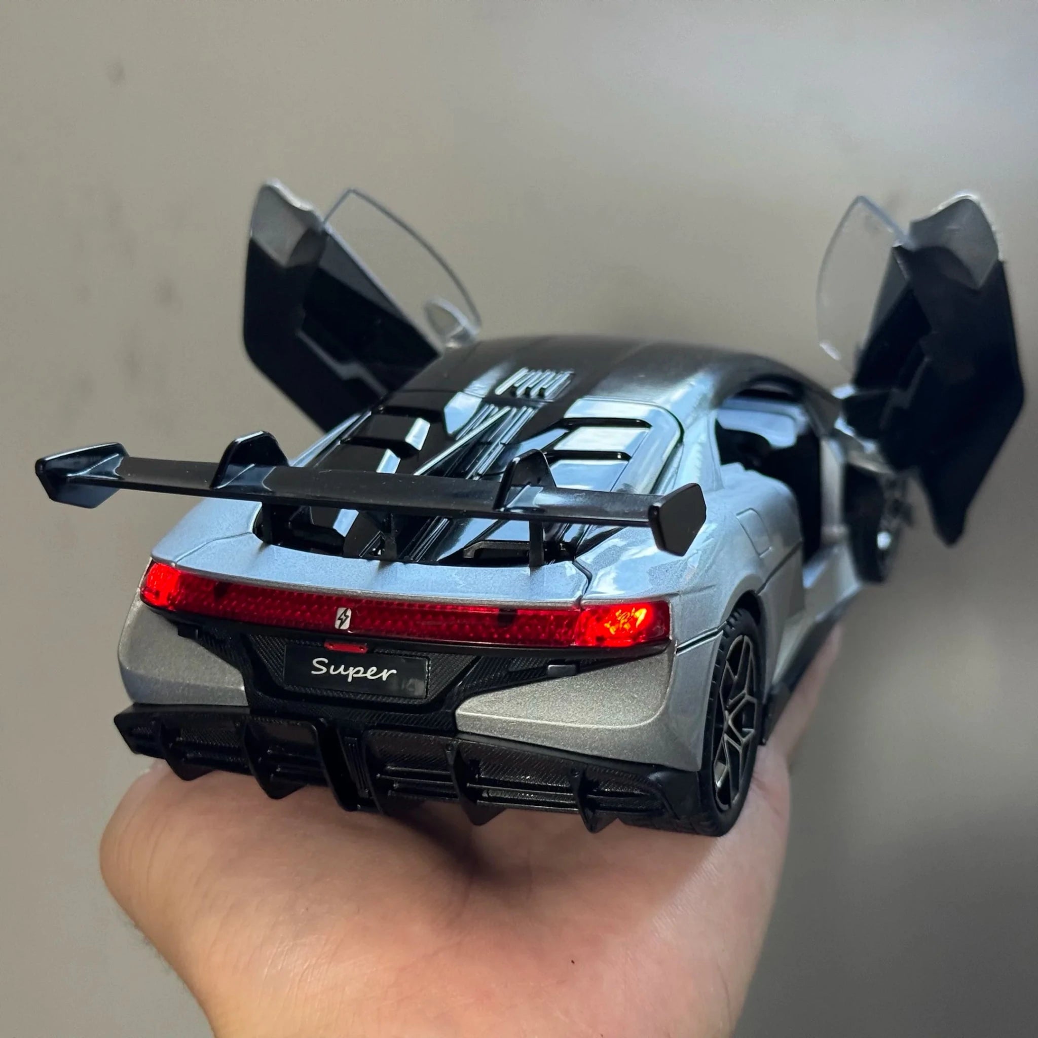Trenches of Mariana Super Toy Car, a diecast alloy model with sound and light features, ideal for children’s birthday gifts.