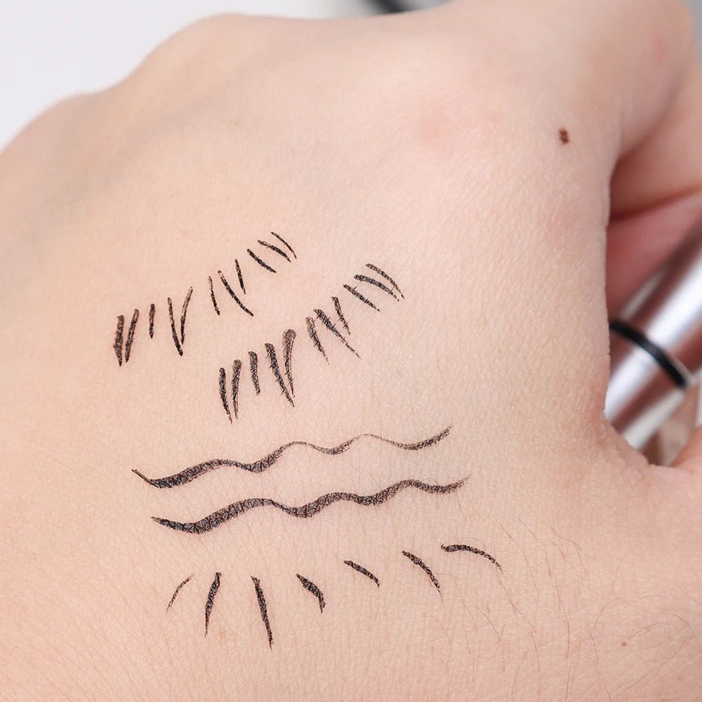 Double-ended waterproof eyelash stamp and eyeliner from Trenches of Mariana, ideal for DIY Korean makeup beginners.