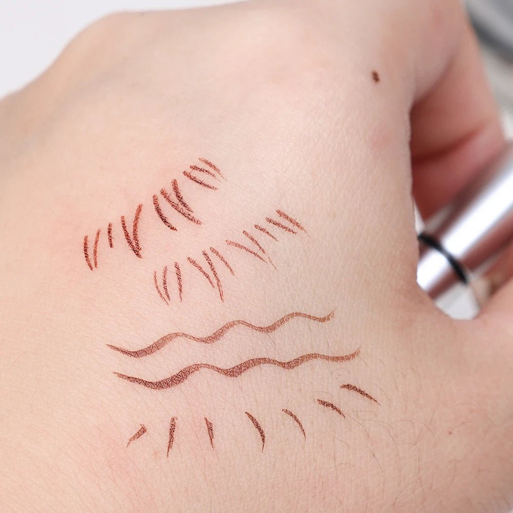 Double-ended eyelash stamp and waterproof eyeliner from Trenches of Mariana, ideal for DIY Korean makeup and beginners.