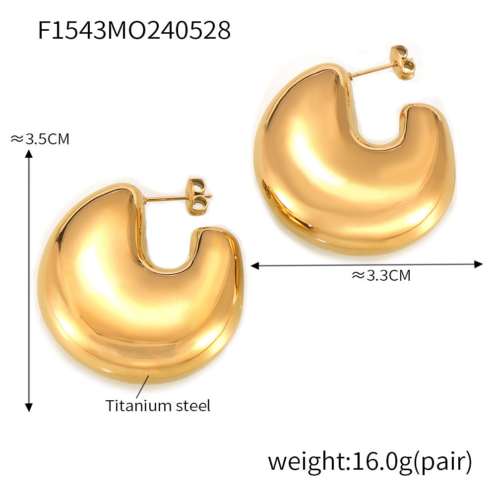 European and American fashion gold geometric C- shaped earrings titanium steel plated 18K gold simple design hollow bright three-dimensional earrings