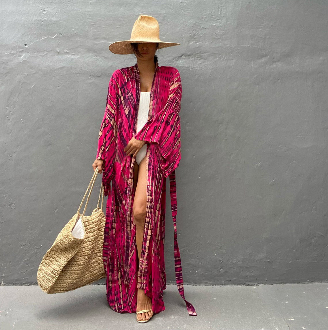 Trenches of Mariana rayon tie-dye beach cover-up with sun protection, loose fit, perfect for women's vacation swimwear.