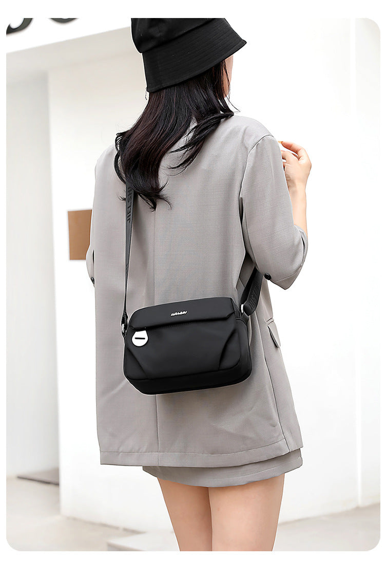 Trenches of Mariana lightweight nylon crossbody bag with water-repellent fabric, casual small shoulder bag for women.