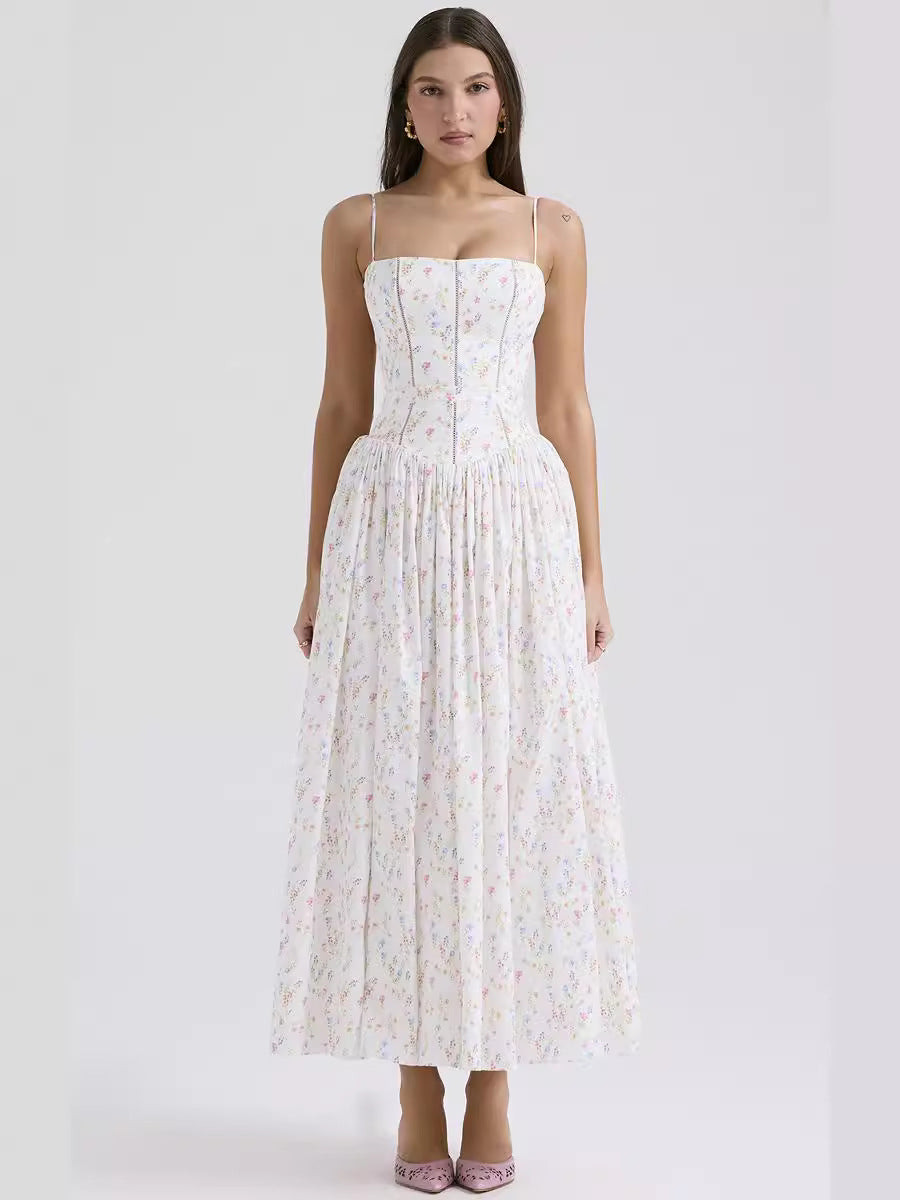 Trenches of Mariana 2025 spring sleeveless long dress with spaghetti straps, printed flared skirt, and waist-cinching design.