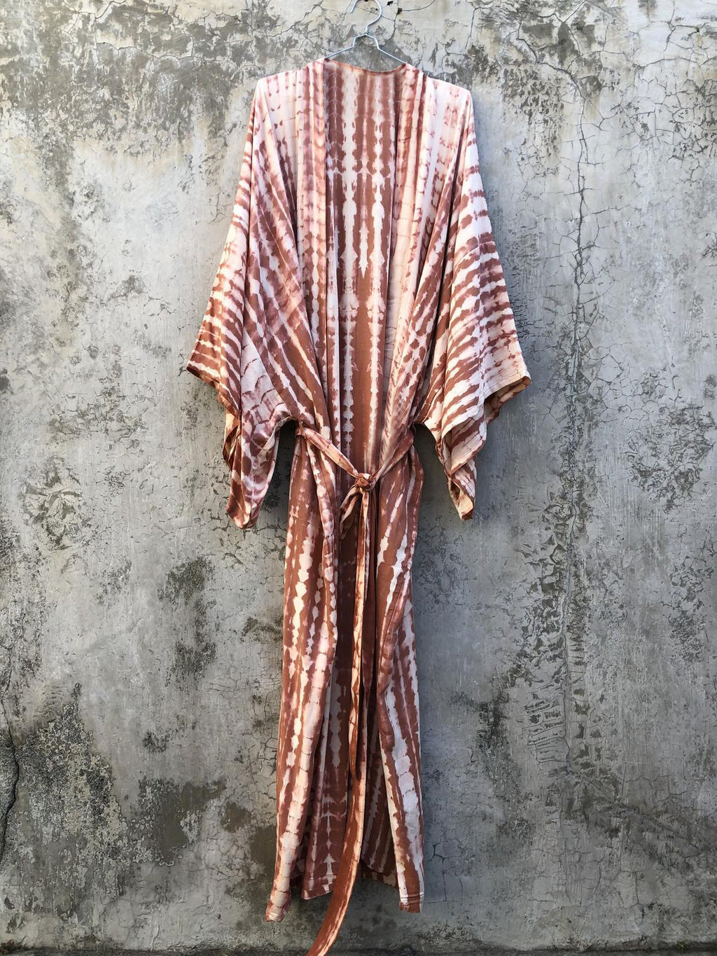 Colorful rayon tie-dye beach cover-up by Trenches of Mariana, loose fit, perfect for sun protection and vacation wear over swimsuits.