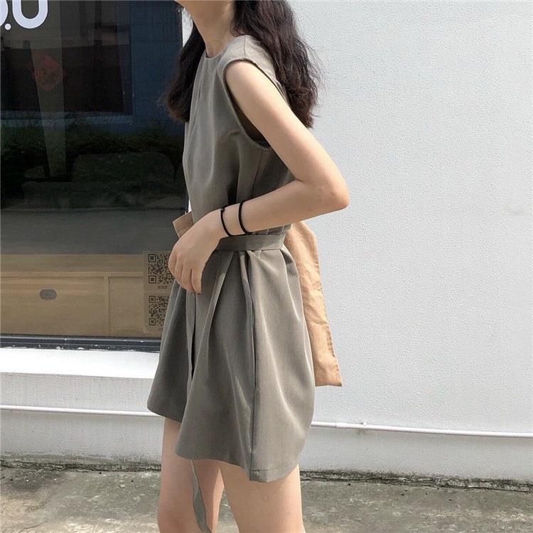 Casual female streetwear jumpsuit by Trenches of Mariana featuring a loose, two-piece Hong Kong style sportswear look.