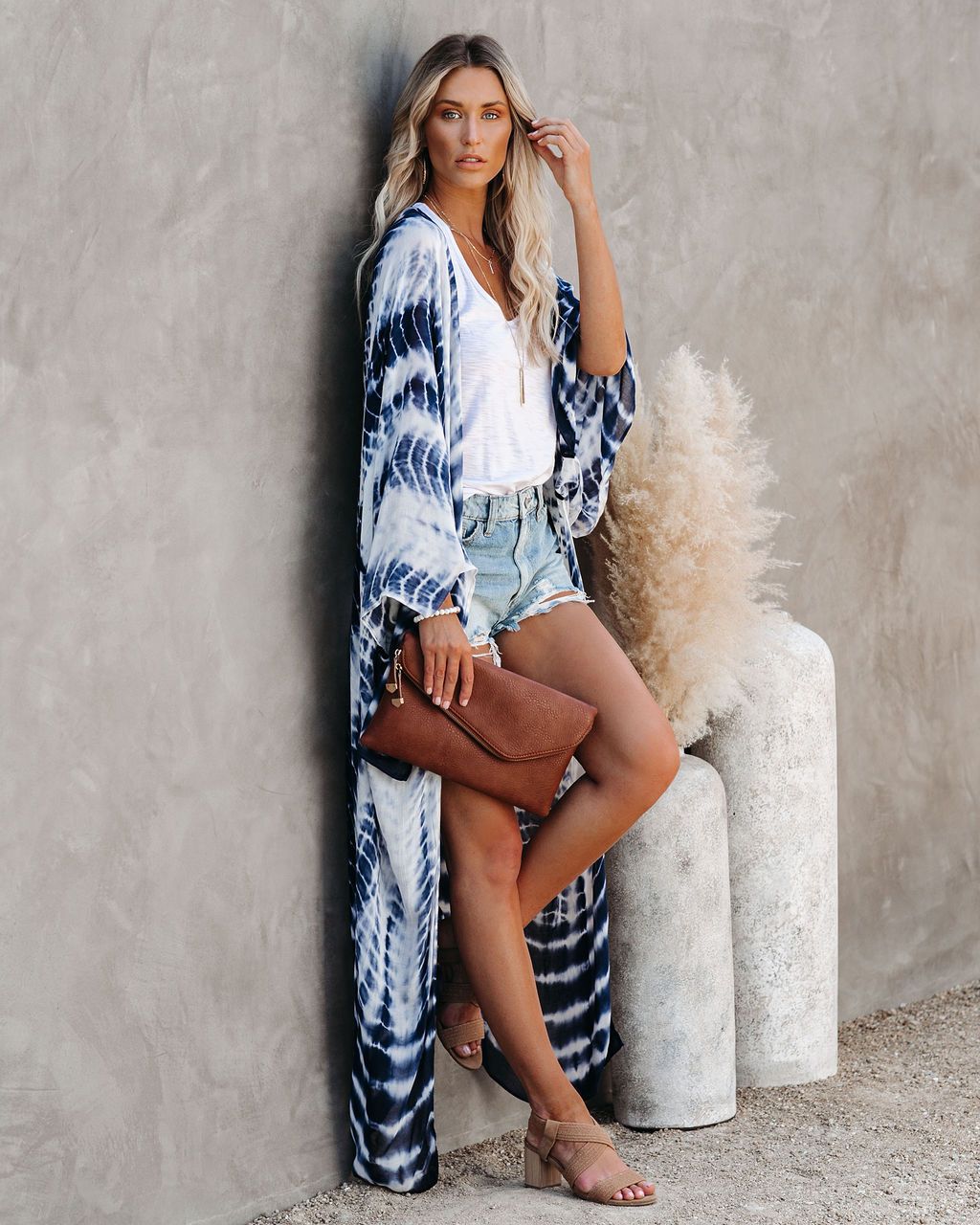 Colorful rayon tie-dye beach cover-up by Trenches of Mariana, featuring a loose fit and sun protection for women's vacation swimwear.