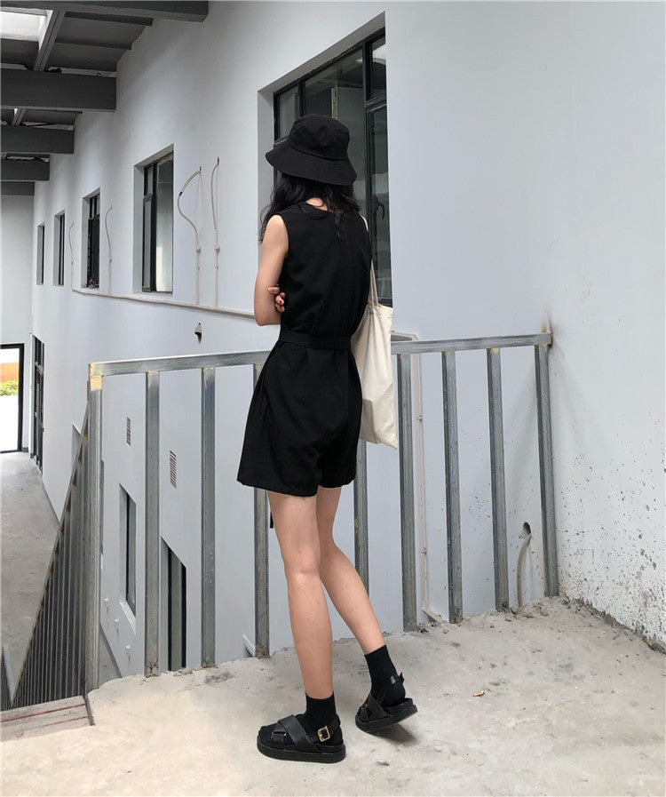 Casual female jumpsuit featuring a loose Hong Kong style streetwear look, trendy two-piece sportswear by Trenches of Mariana.