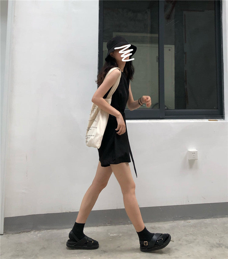 Casual female streetwear jumpsuit by Trenches of Mariana featuring a loose two-piece Hong Kong style student-inspired design.