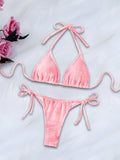 Pink women's bikini set by Trenches of Mariana featuring a backless, split European and American style two-piece swimsuit.