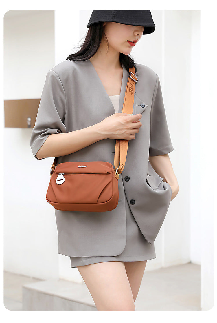 Trenches of Mariana lightweight water-repellent nylon crossbody bag for women, casual and stylish shoulder bag with small, versatile design