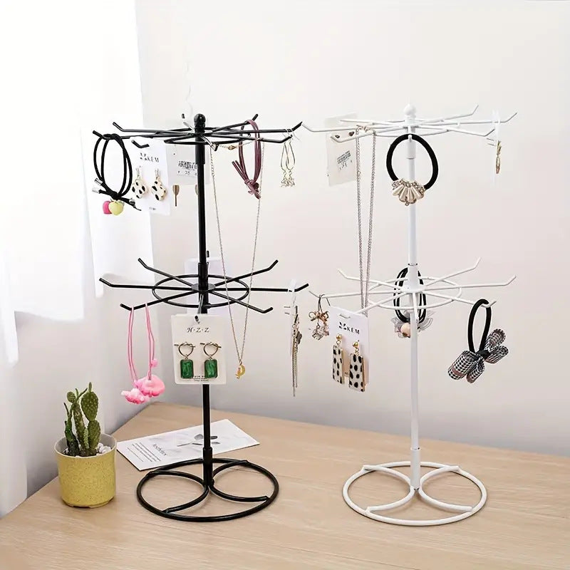 Rotating jewelry display rack with two-layer shelf for necklaces and bracelets, by Trenches of Mariana