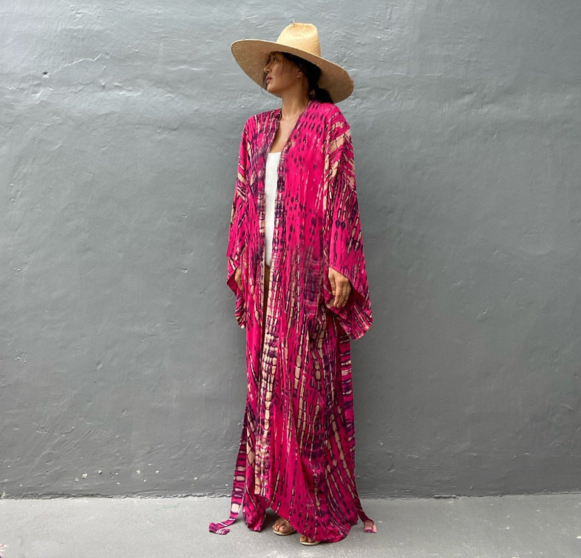 Colorful rayon tie-dye beach cover-up by Trenches of Mariana, lightweight sun protection for women's vacation swimwear.