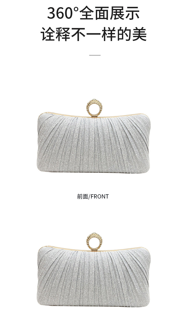Trenches of Mariana Chinese-style pleated dinner clutch bag with cross-body strap, suitable for evening and banquet occasions.