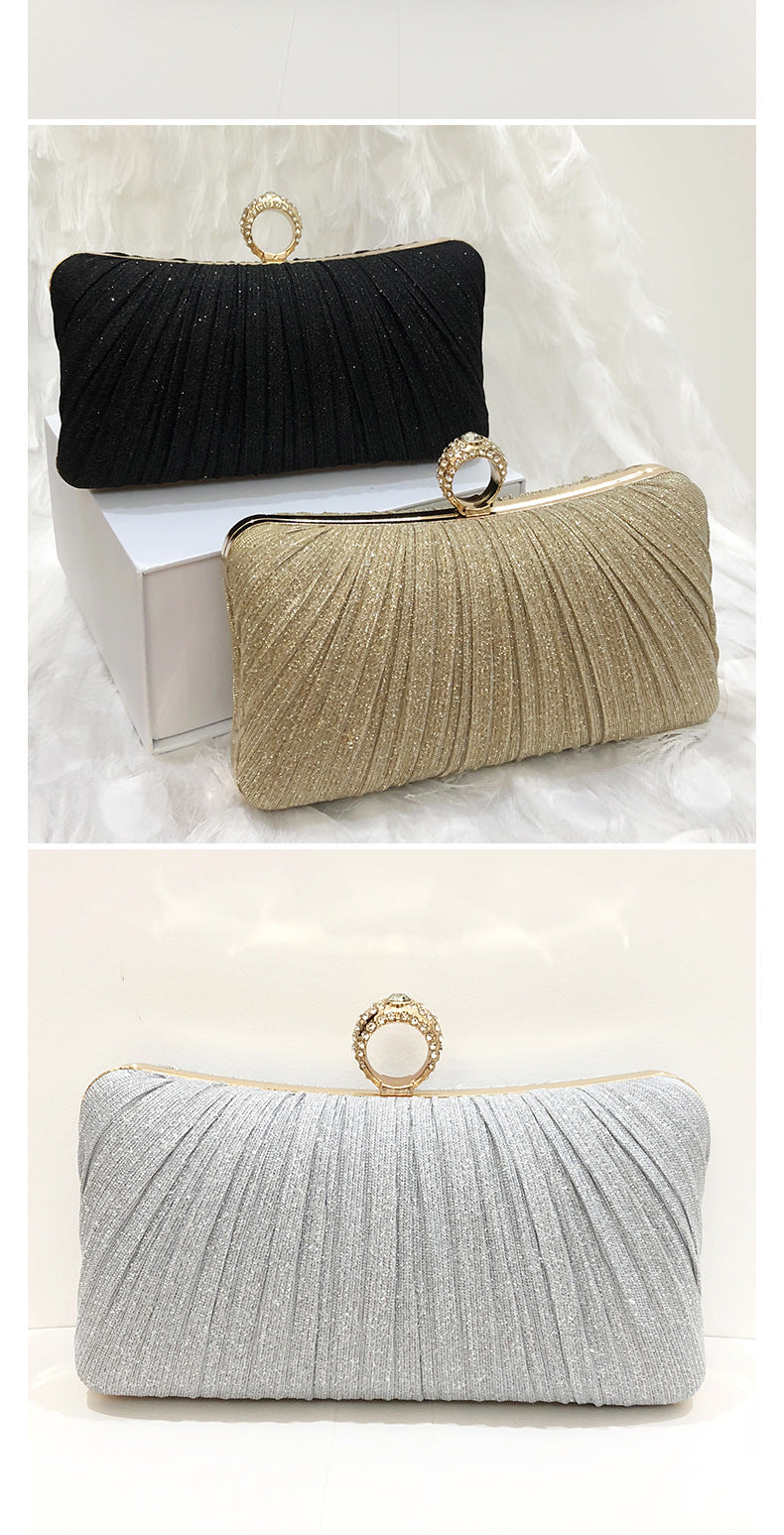 Trenches of Mariana Chinese-style pleated dinner clutch bag with cross-body strap, elegant evening bag for special occasions.