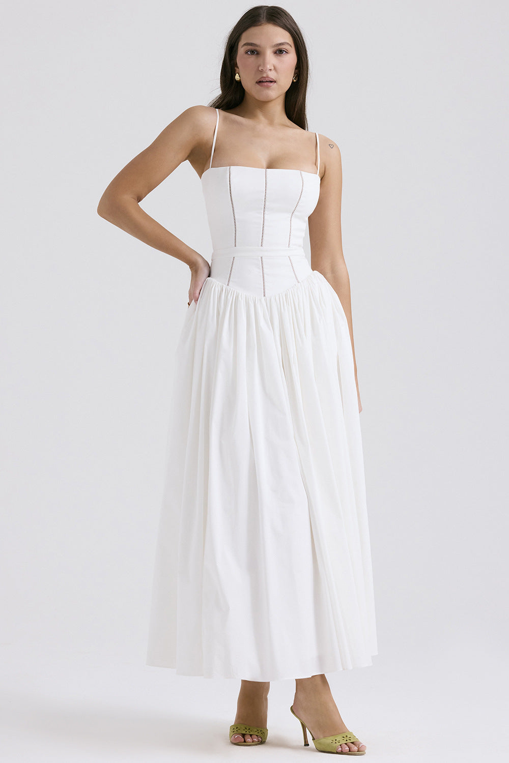 Trenches of Mariana women's sleeveless long dress with spaghetti straps, printed flared skirt, and waist-cinching design for spring fashion.