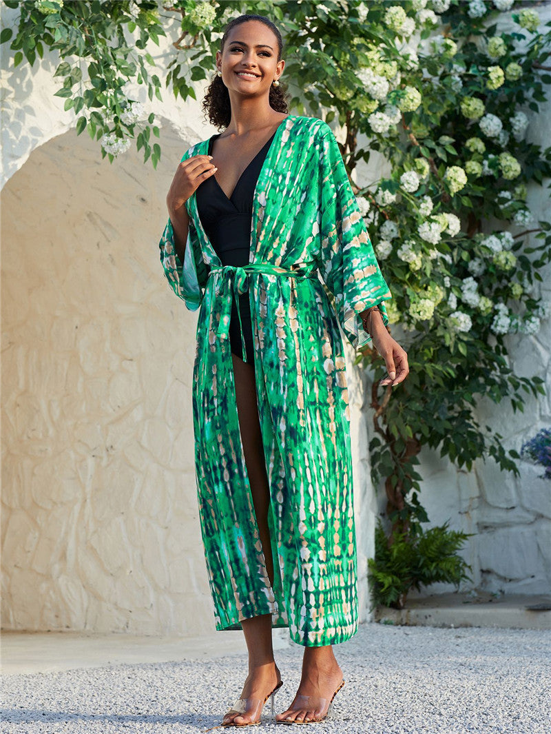 Trenches of Mariana rayon tie-dye beach cover-up with sun protection and loose fit, perfect for women's vacation swimwear.