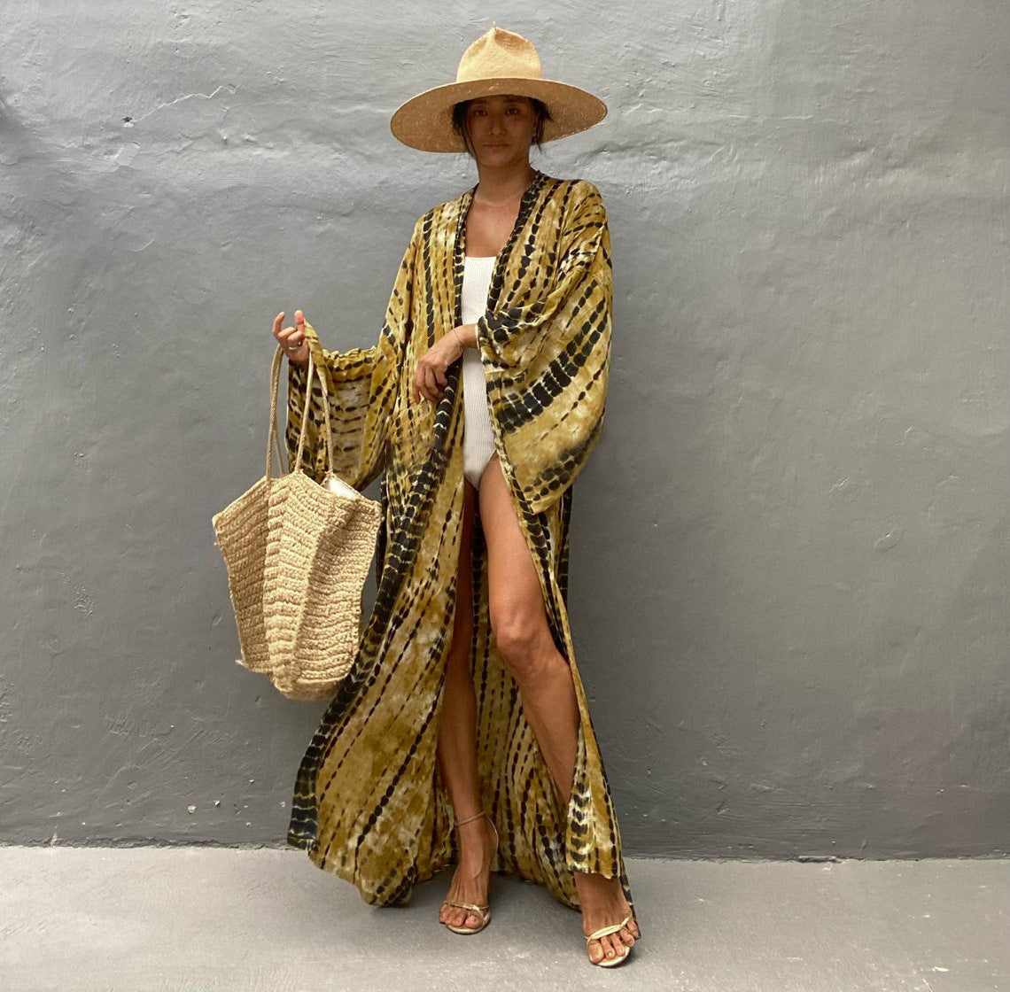 Trenches of Mariana rayon tie-dye beach cover-up with sun protection, loose fit, perfect for women's vacation and swimwear.