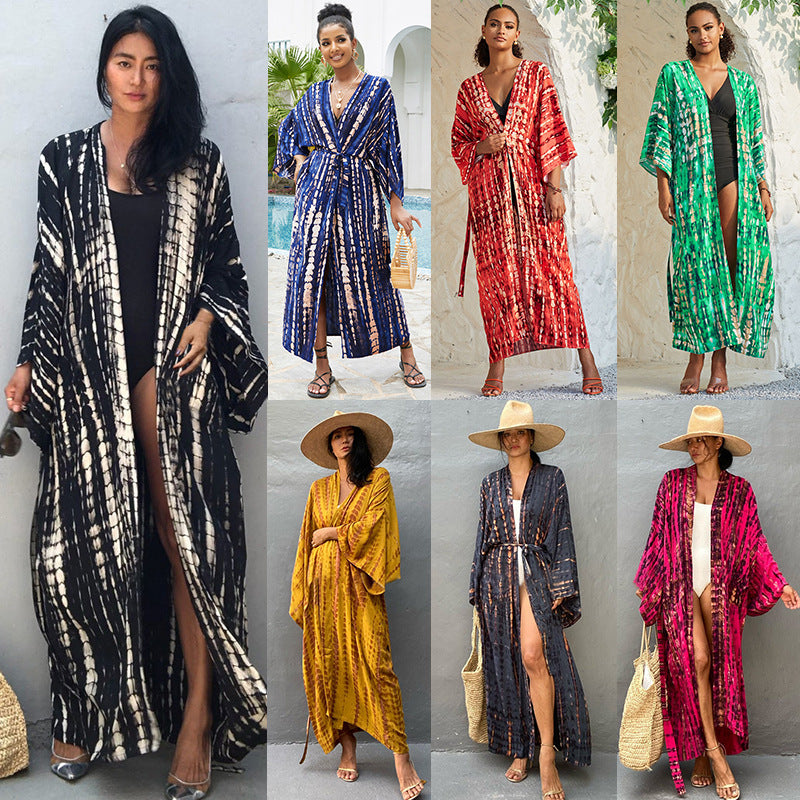 Trenches of Mariana rayon tie-dye beach cover-up with sun protection, loose fit, perfect for women's vacation and swimsuit outerwear.