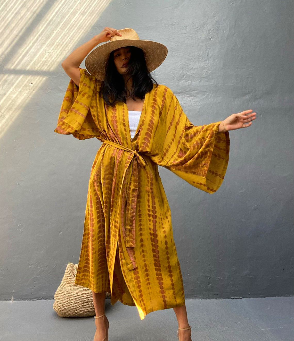 Trenches of Mariana rayon tie-dye beach cover-up with sun protection, loose fit, ideal for women's vacation swimwear outerwear.