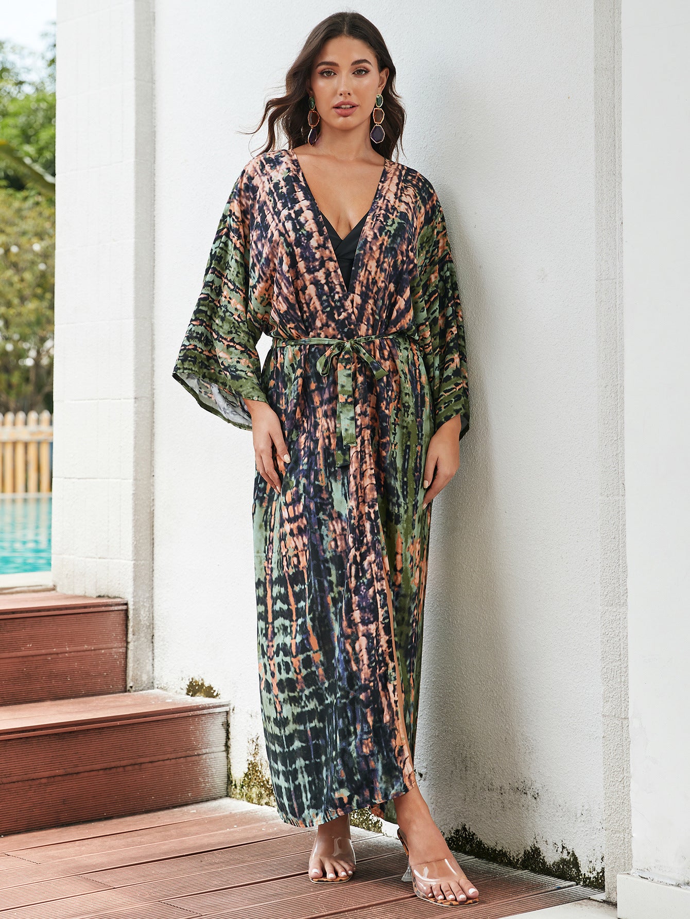 Colorful rayon tie-dye beach cover-up by Trenches of Mariana, featuring a loose fit and sun protection for women's vacation swimwear.