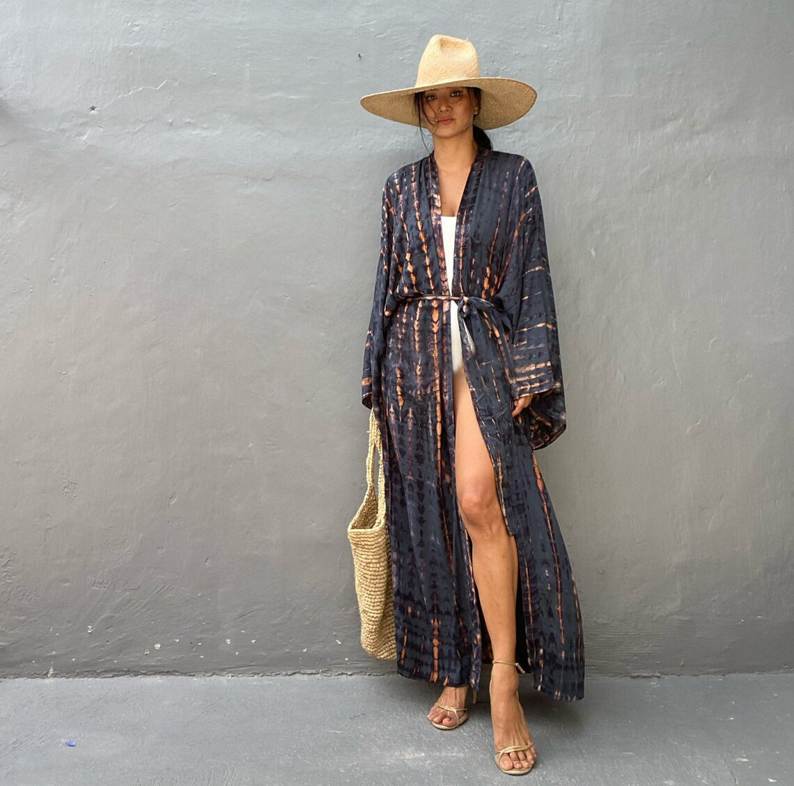 Colorful rayon tie-dye beach cover-up by Trenches of Mariana featuring a loose, breezy design for women's vacation and swimwear.