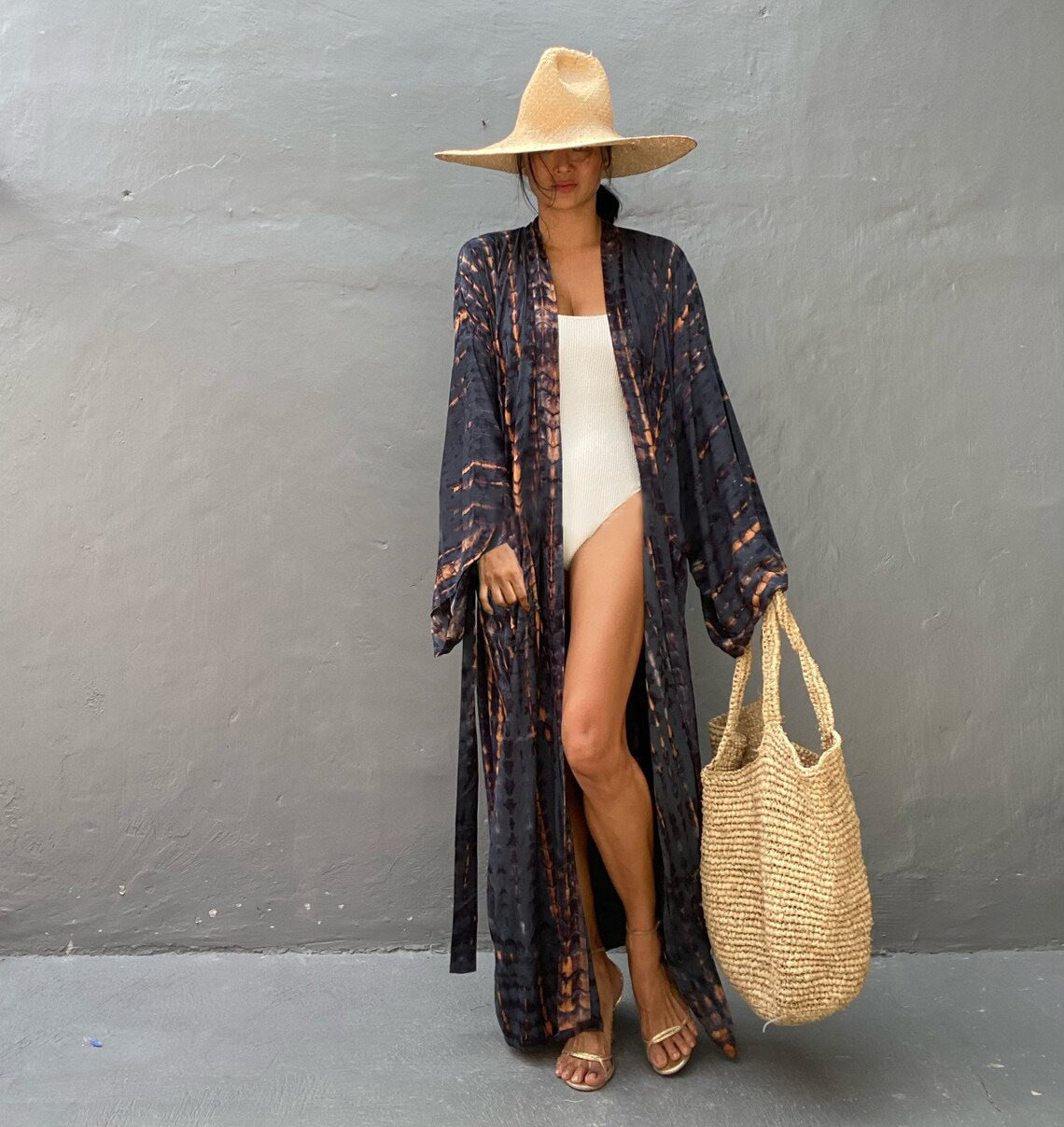Women's loose rayon tie-dye beach cover-up by Trenches of Mariana, featuring sun protection and stylish swimwear outerwear for vacation.