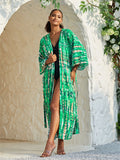Colorful rayon tie-dye beach cover-up for women by Trenches of Mariana, loose fit, perfect for sun protection and vacation wear.