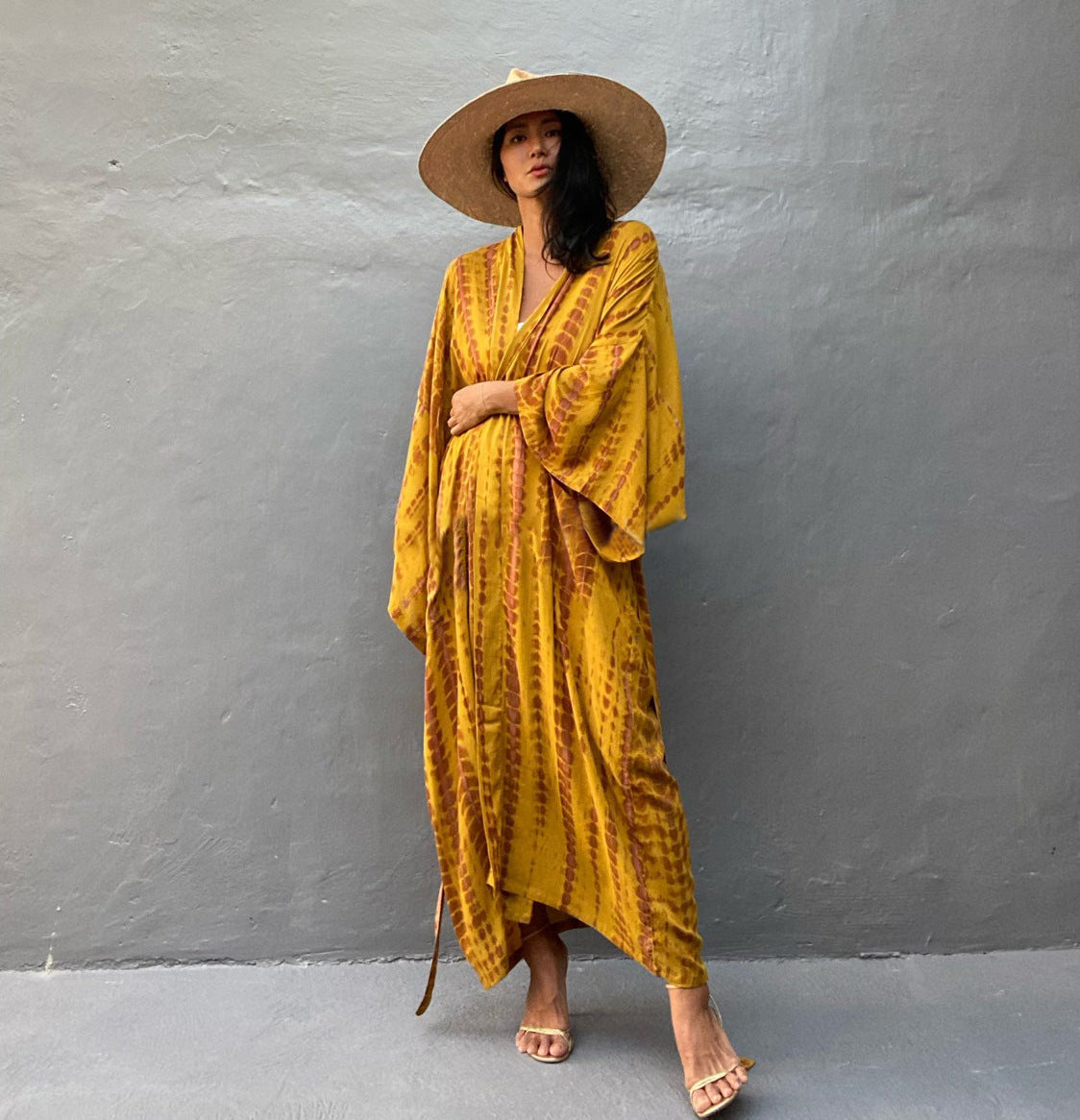 Colorful rayon tie-dye beach cover-up by Trenches of Mariana, featuring a loose fit and sun protection for women's vacation wear.
