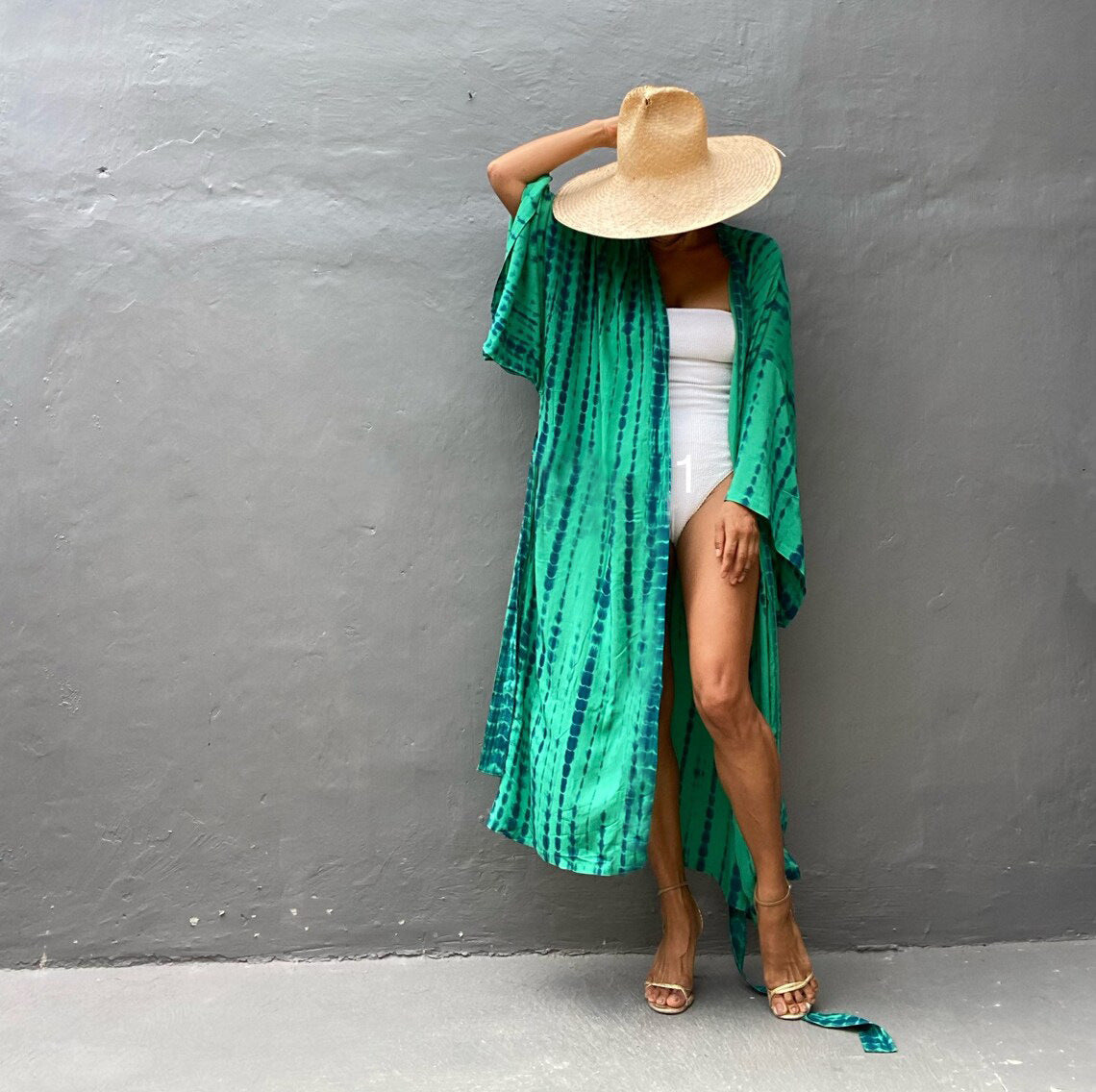 Trenches of Mariana rayon tie-dye beach cover-up with loose fit, ideal for women's vacation sun protection over swimsuits.