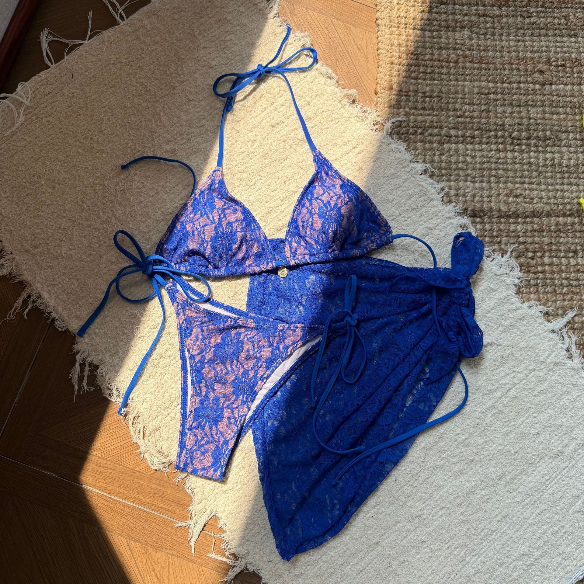 European and American 2025 Trenches of Mariana sexy lace mesh three-piece bikini swimsuit with short skirt, featuring composite fabric.