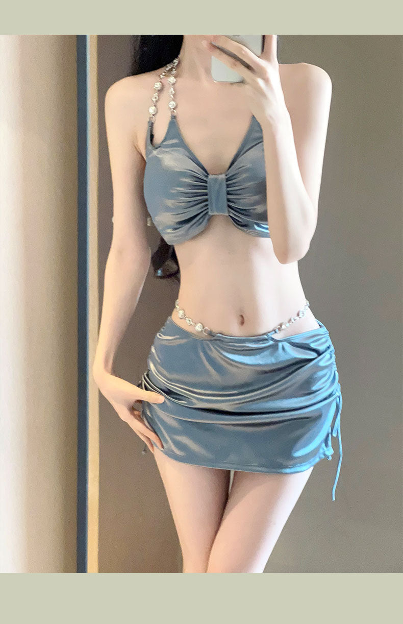 Silver women's bikini set by Trenches of Mariana featuring a high-end, sexy three-piece swimsuit for hot spring vacations.