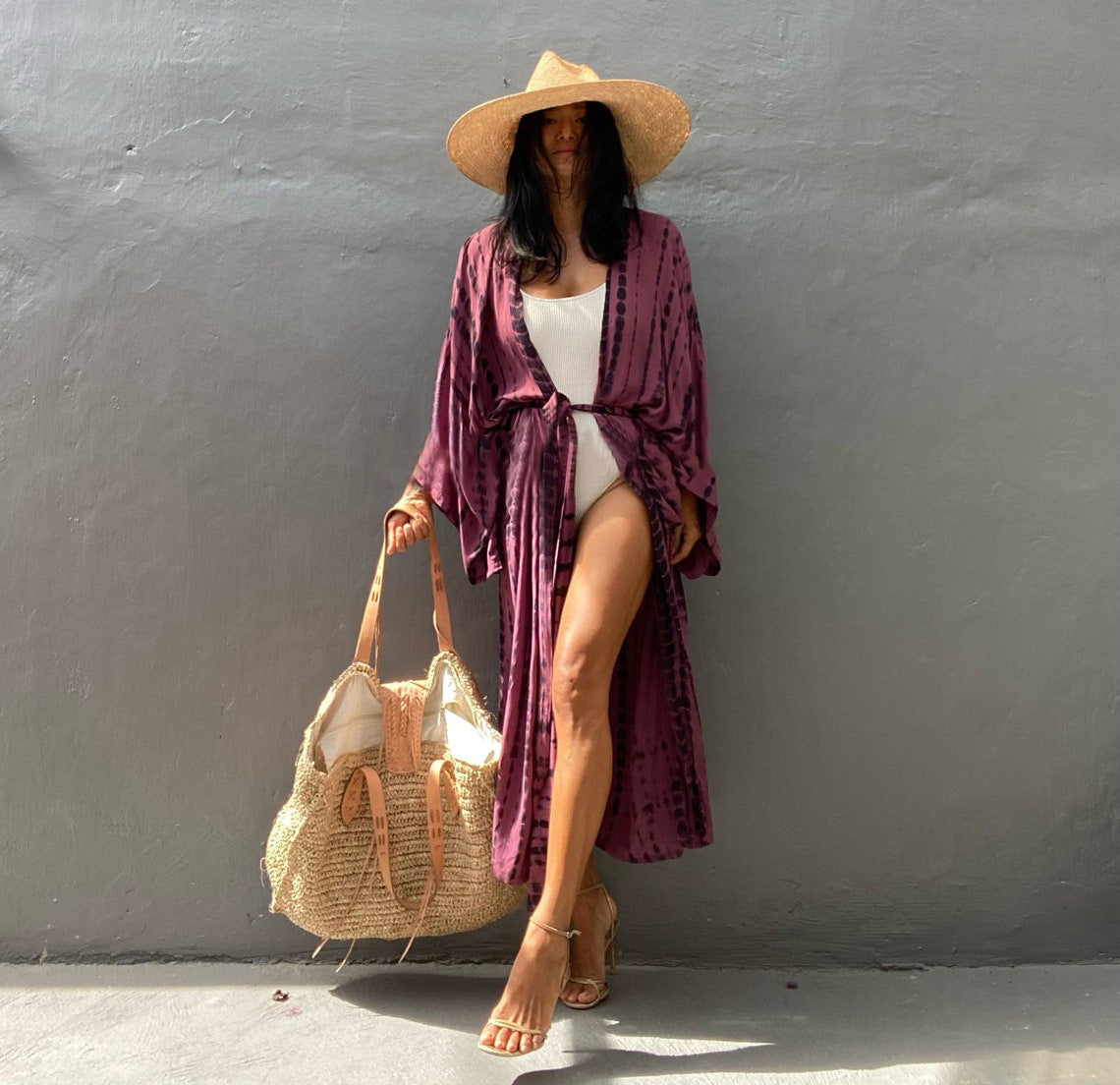 Trenches of Mariana rayon tie-dye beach cover-up with sun protection, loose fit, perfect for women's vacation over swimsuits.