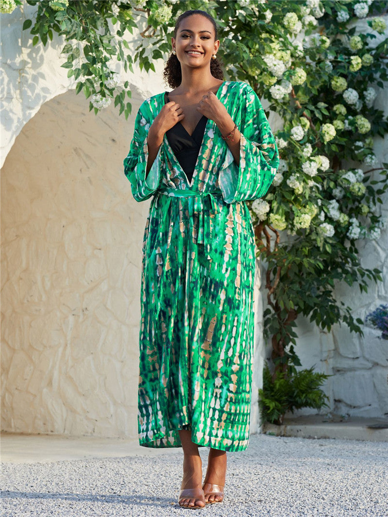 Trenches of Mariana rayon tie-dye beach cover-up with sun protection, loose fit, perfect for women's vacation swimwear.