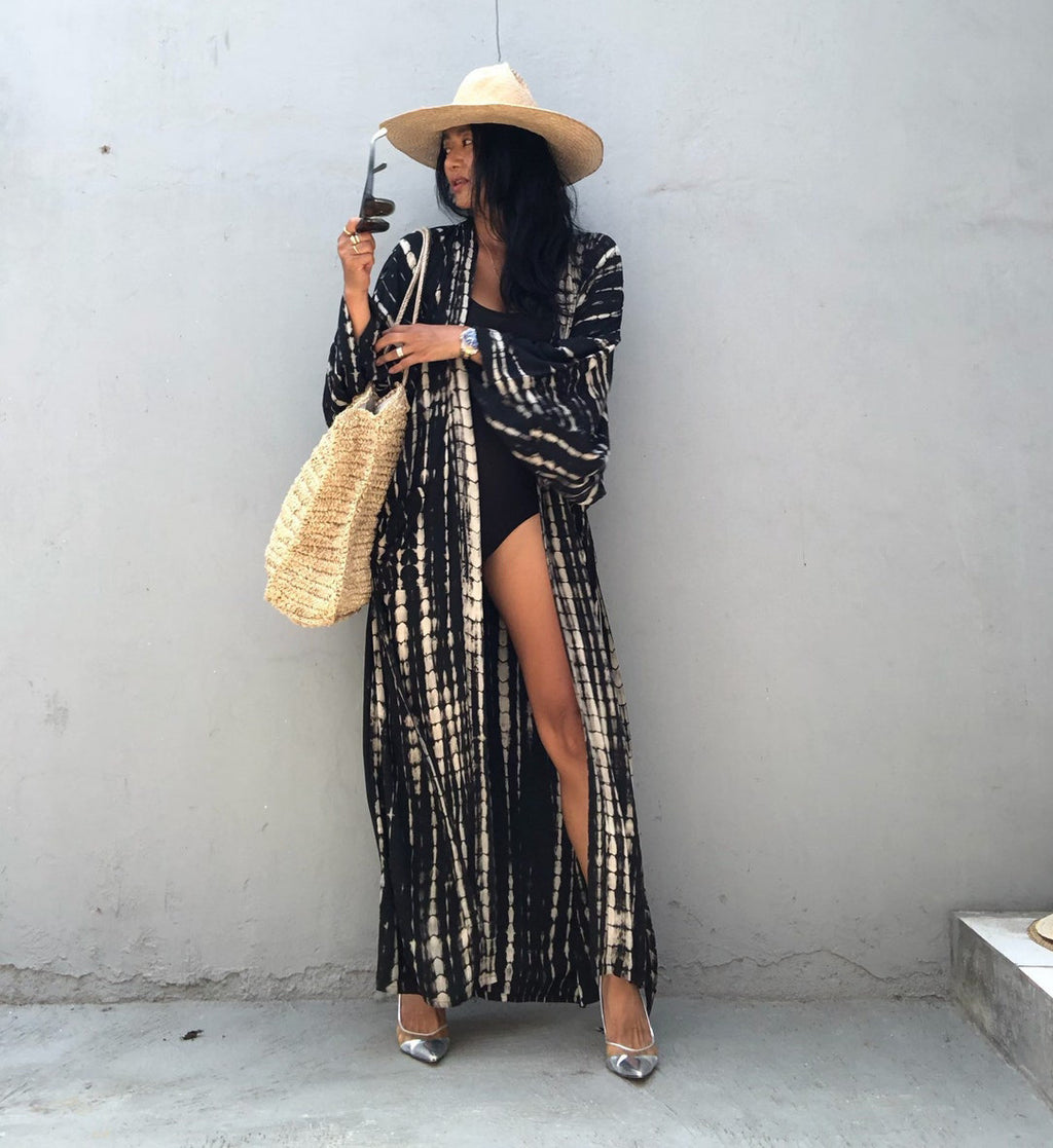 Trenches of Mariana rayon tie-dye beach cover-up with sun protection, loose fit, perfect for women's vacation swimwear outerwear.