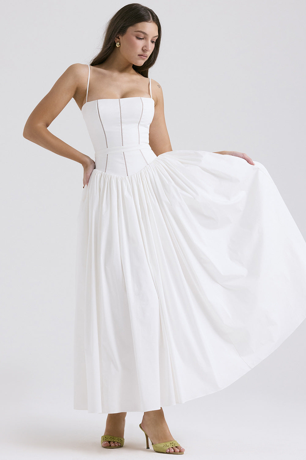 Long sleeveless printed flared skirt from Trenches of Mariana featuring spaghetti straps, low neck, and waist-cinching design.