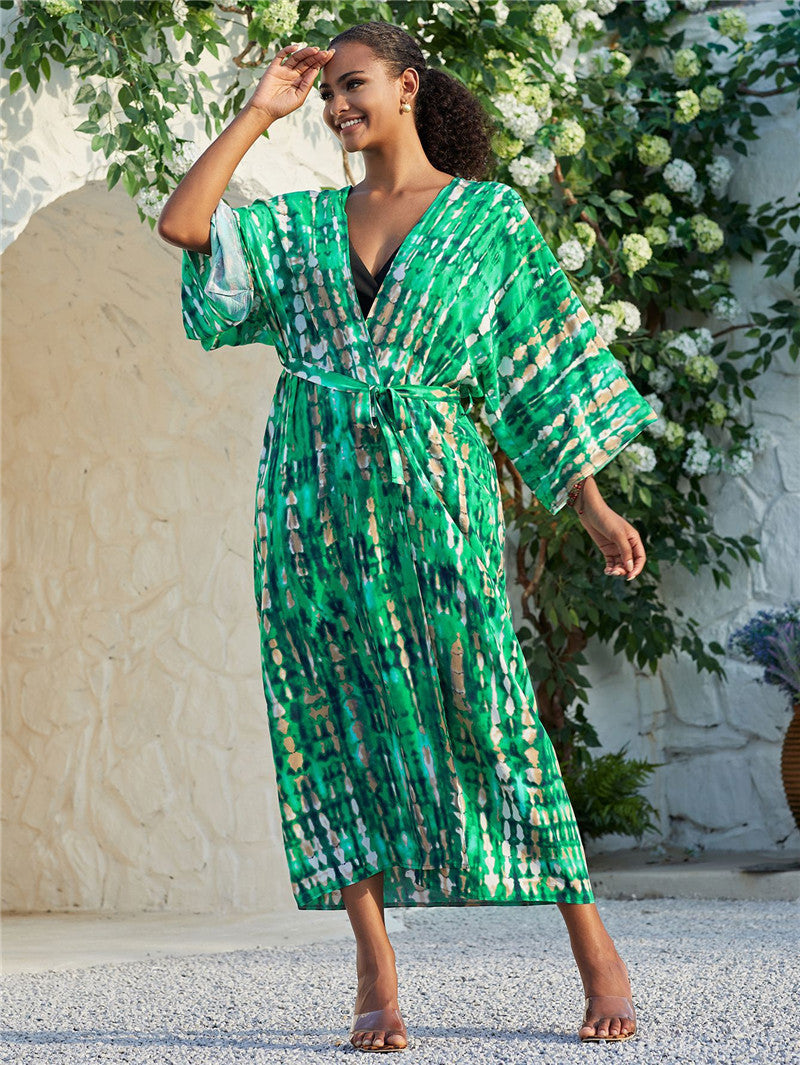 Trenches of Mariana rayon tie-dye beach cover-up with sun protection, loose fit, ideal for women's vacation over swimsuit.