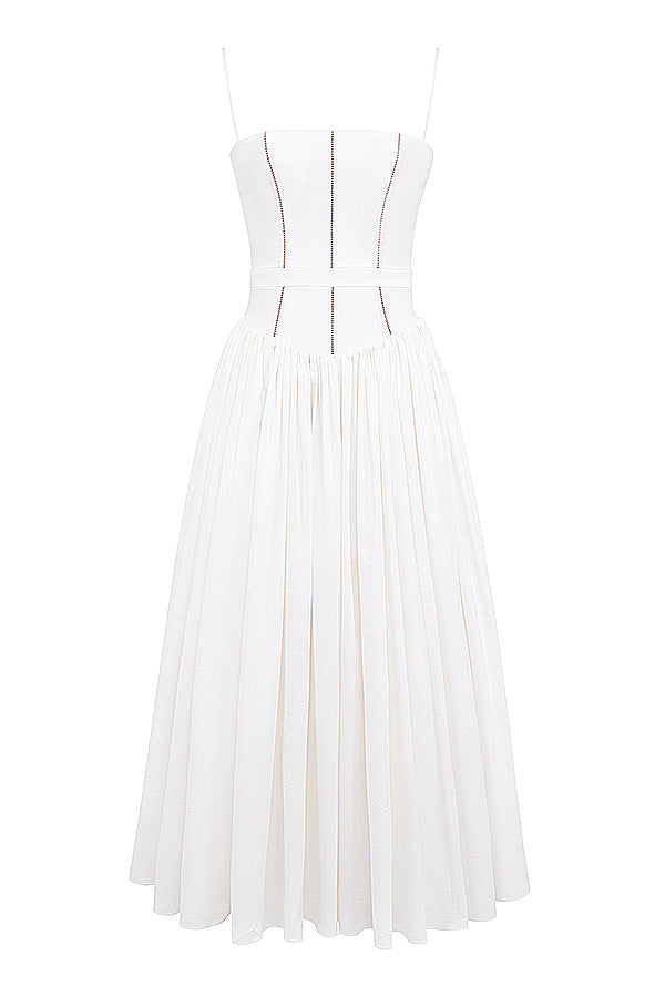 Trenches of Mariana women's long spring dress with spaghetti straps, low neck, printed flared skirt, and waist-cinching design.
