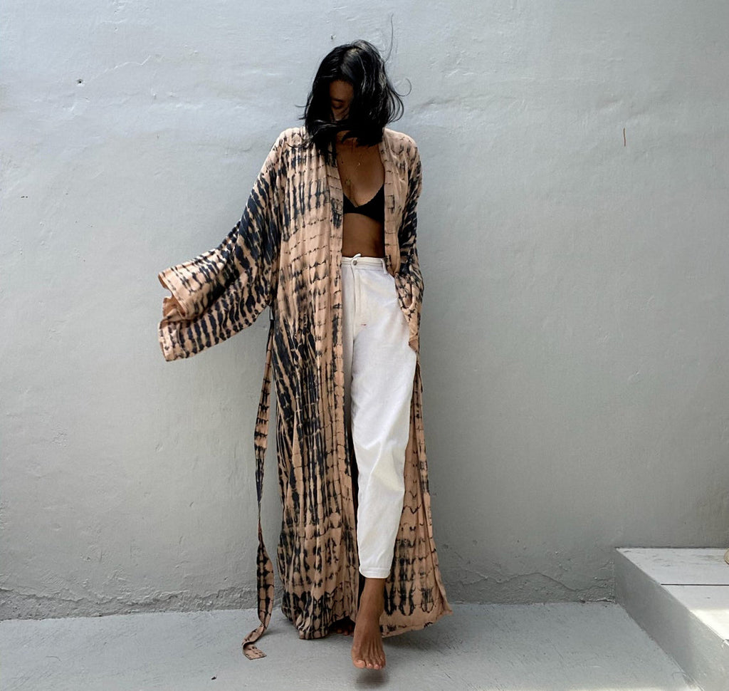 Beach cover-up by Trenches of Mariana featuring colorful rayon tie-dye fabric, loose fit, ideal for sun protection and women's vacation wear.