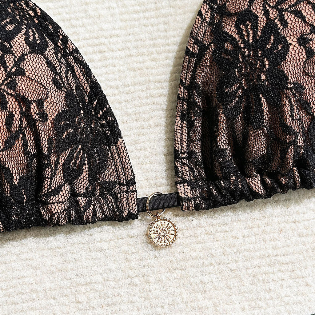 Three-piece lace and mesh bikini swimsuit by Trenches of Mariana featuring a short skirt, European and American style, in vibrant fabric.