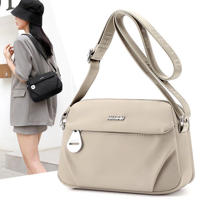 Trenches of Mariana lightweight nylon crossbody bag with water-repellent fabric, stylish small shoulder bag for women.