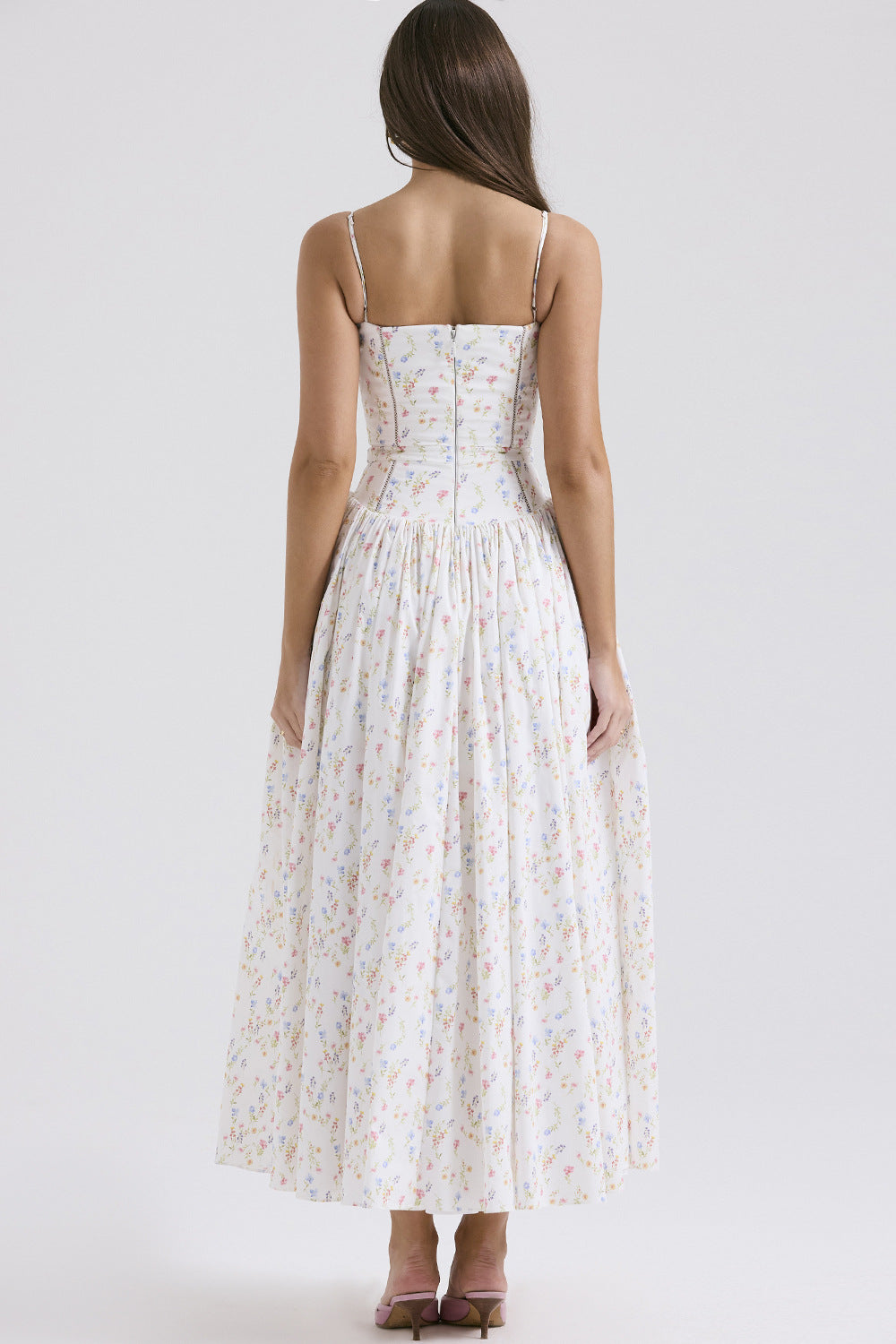 Trenches of Mariana women's sleeveless, low-neck printed flared long dress with spaghetti straps and waist-cinching design for early spring.