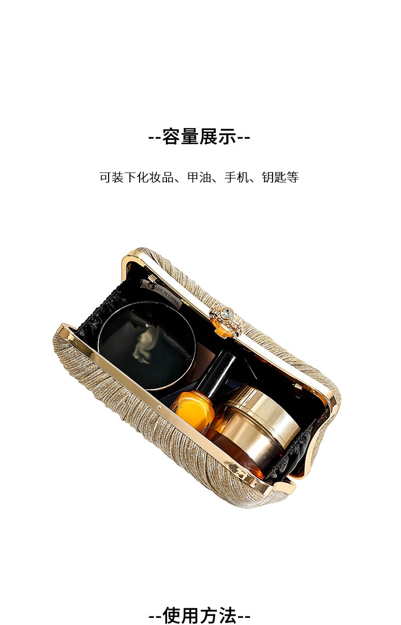 Elegant pleated Chinese-style dinner clutch bag by Trenches of Mariana, featuring a cross-body design for evening and banquet occasions.