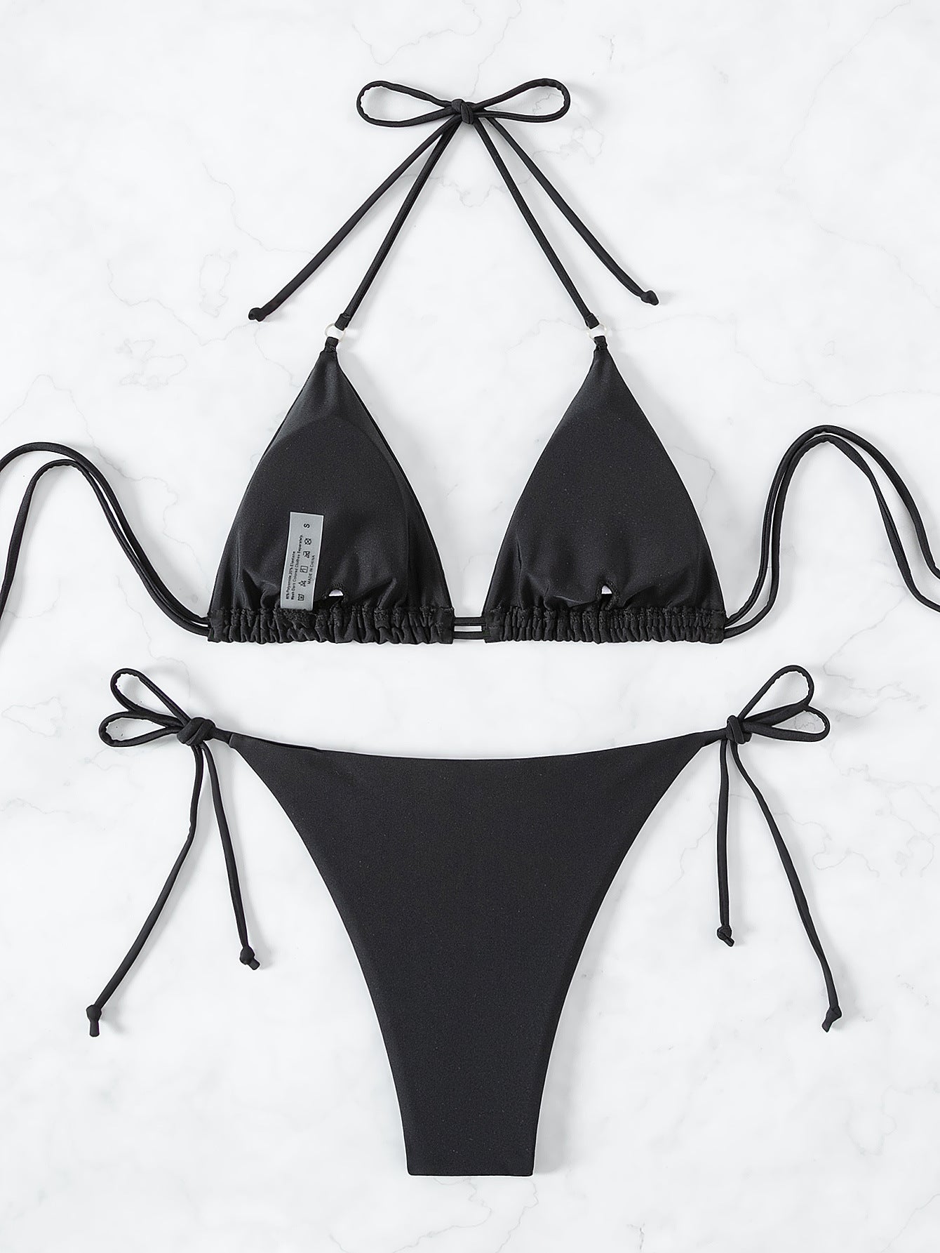Trenches of Mariana sexy diamond bikini swimsuit with solid color, strappy design, perfect for beach or poolside wear.