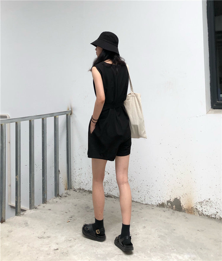 Casual female jumpsuit by Trenches of Mariana featuring a loose streetwear style, two-piece design, in Hong Kong fashion style.