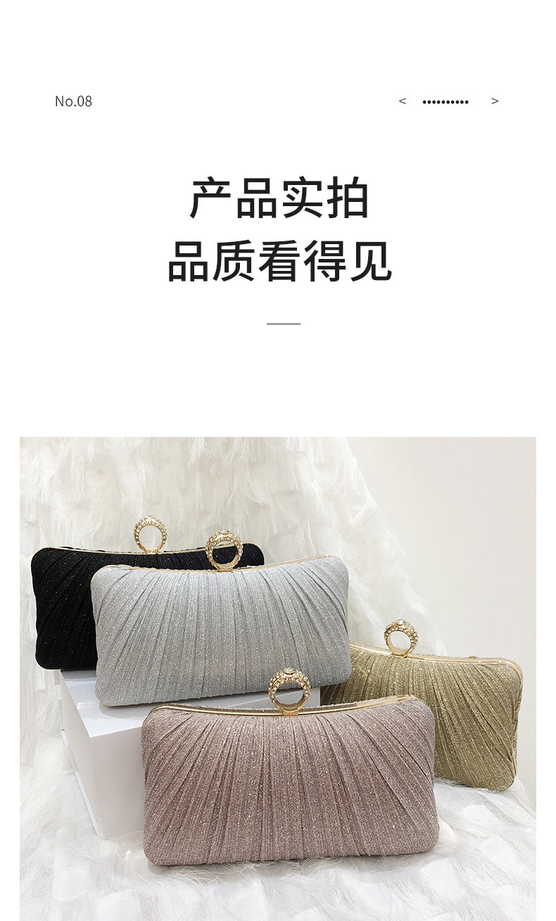 Elegant Trenches of Mariana pleated Chinese-style evening clutch bag with cross-body strap, suitable for banquets and formal events.
