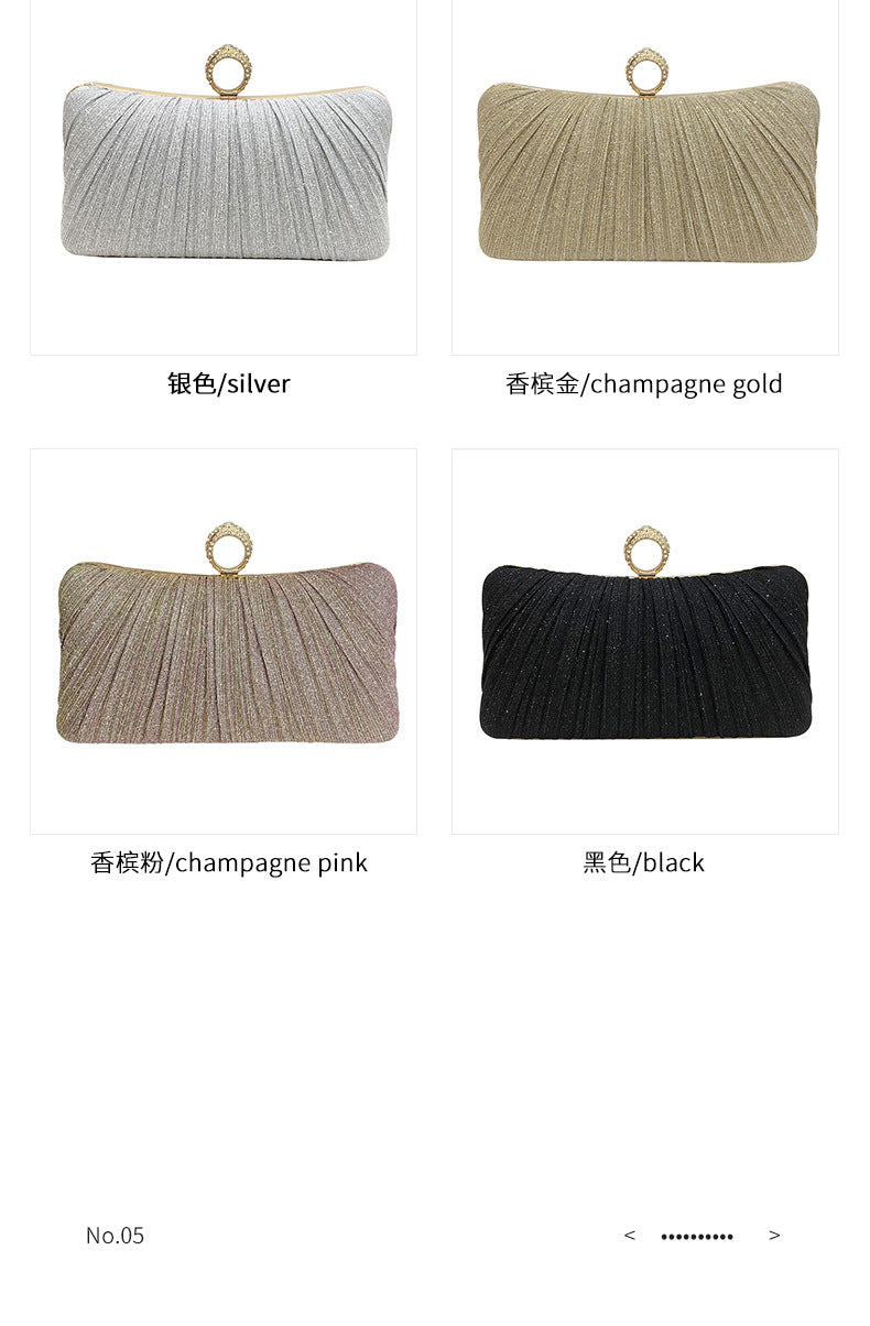 Trenches of Mariana pleated Chinese-style dinner clutch bag with cross-body strap, suitable for evening events and banquets.