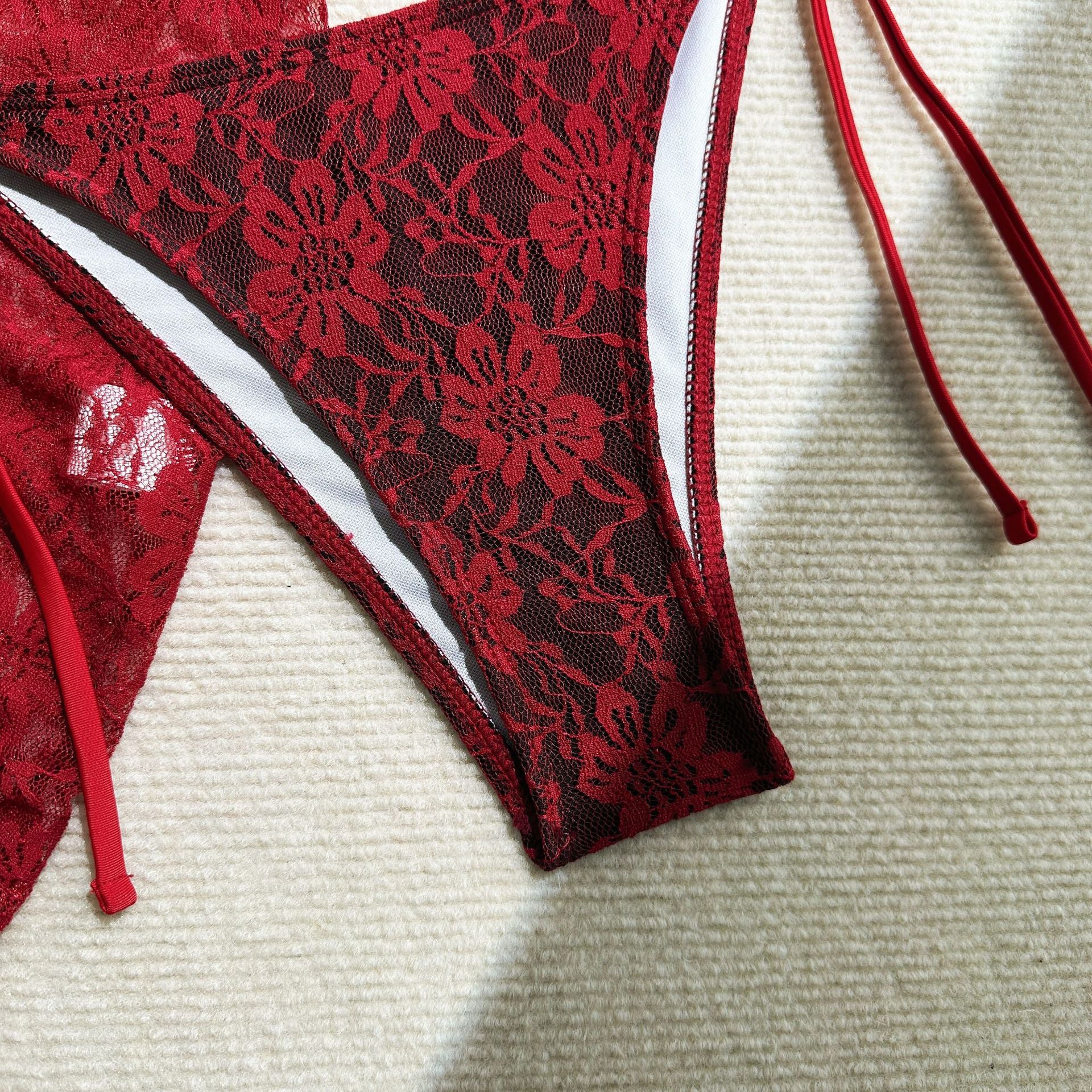 European and American lace bikini set with mesh short skirt, featuring composite fabric, by Trenches of Mariana.